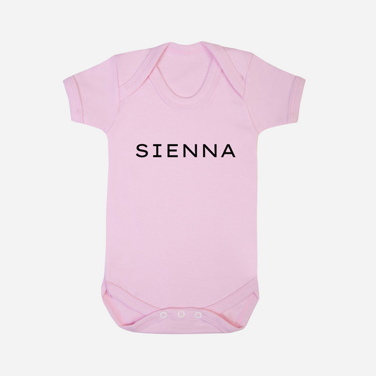 Personalised classic baby bodysuit in bubblegum pink with custom text