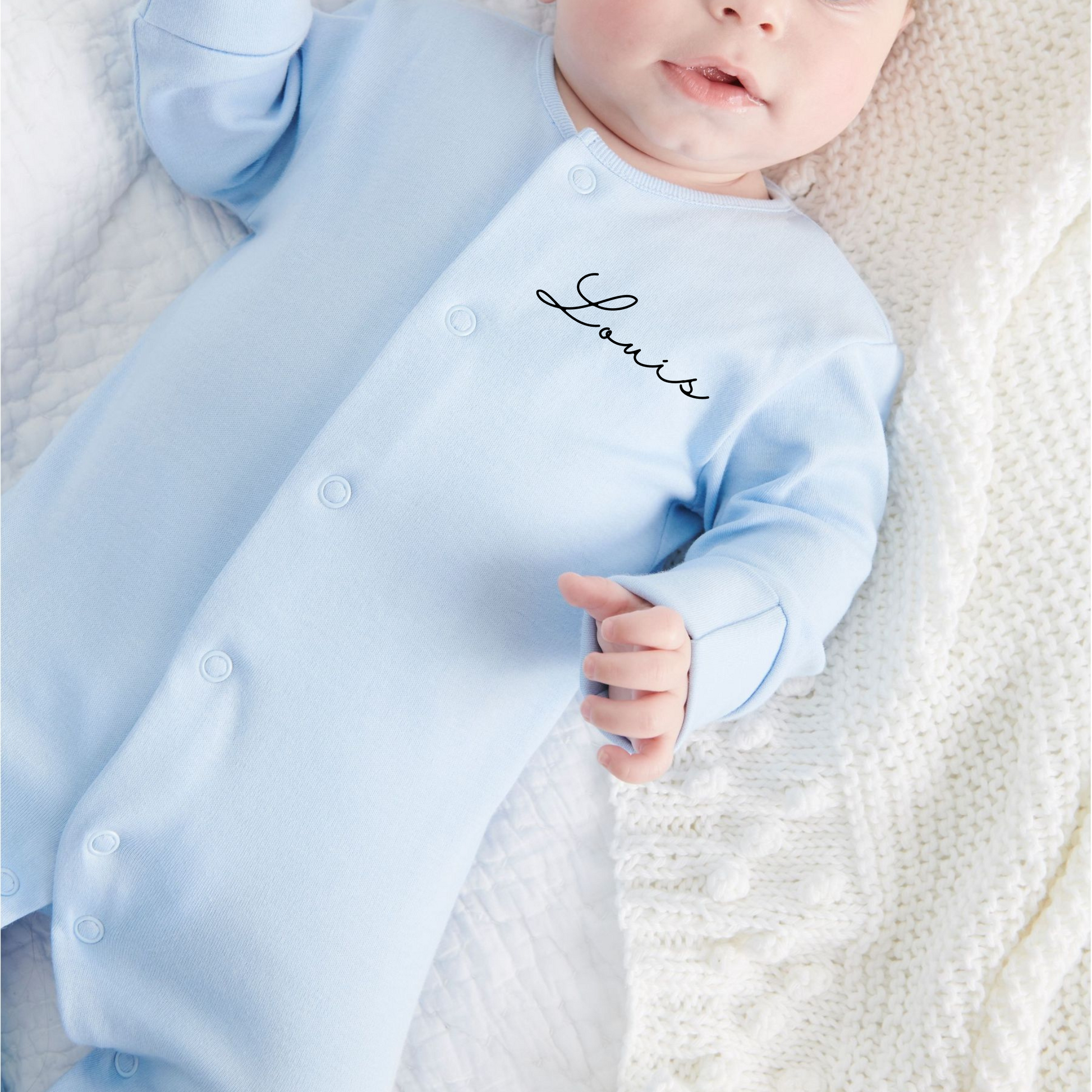 Personalised classic baby sleepsuit in colour cerulean blue