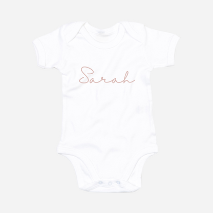 Personalised organic baby bodysuit in white with custom text